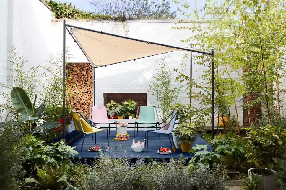 Mariposa garden shade structure over a colourful outdoor dining area