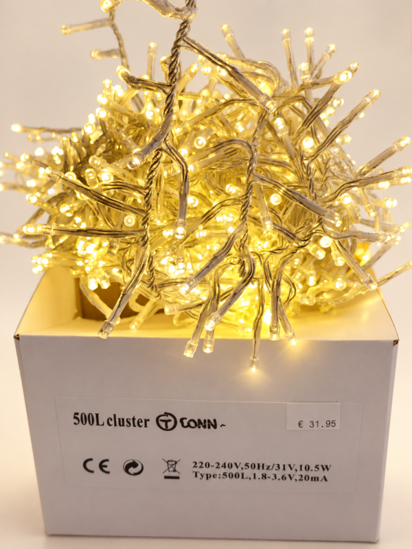 String Lights on Warm-White Background-8 Connectible Warm White Cluster Lights – 500 Bulbs