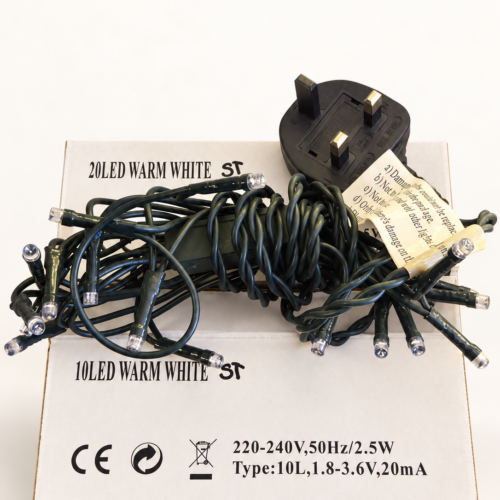 String lights on a soft warm-white background-16 LED Christmas String Lights – 20 Bulbs